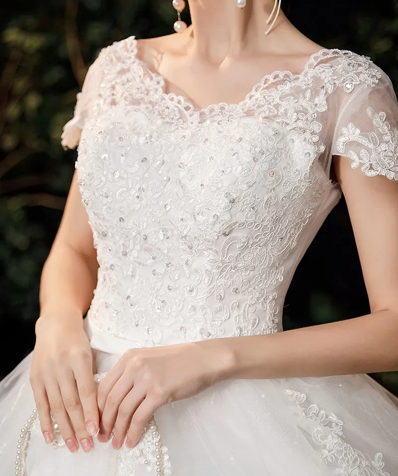 2026 Luxury Lace V Neck Ball Gown Wedding Dresses Short Sleeve Princess Illusion Applique Bridal Gowns Casamento Customized