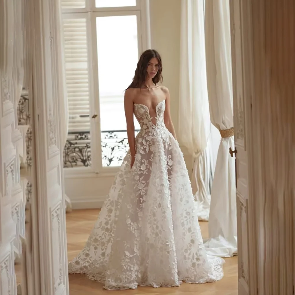 LSYX 2026 Trendy Strapless Deep V Neckline 3D Floral Lace-Embellished Sheer Illusion Sexy Wedding Dress Long Train Bridal Gowns