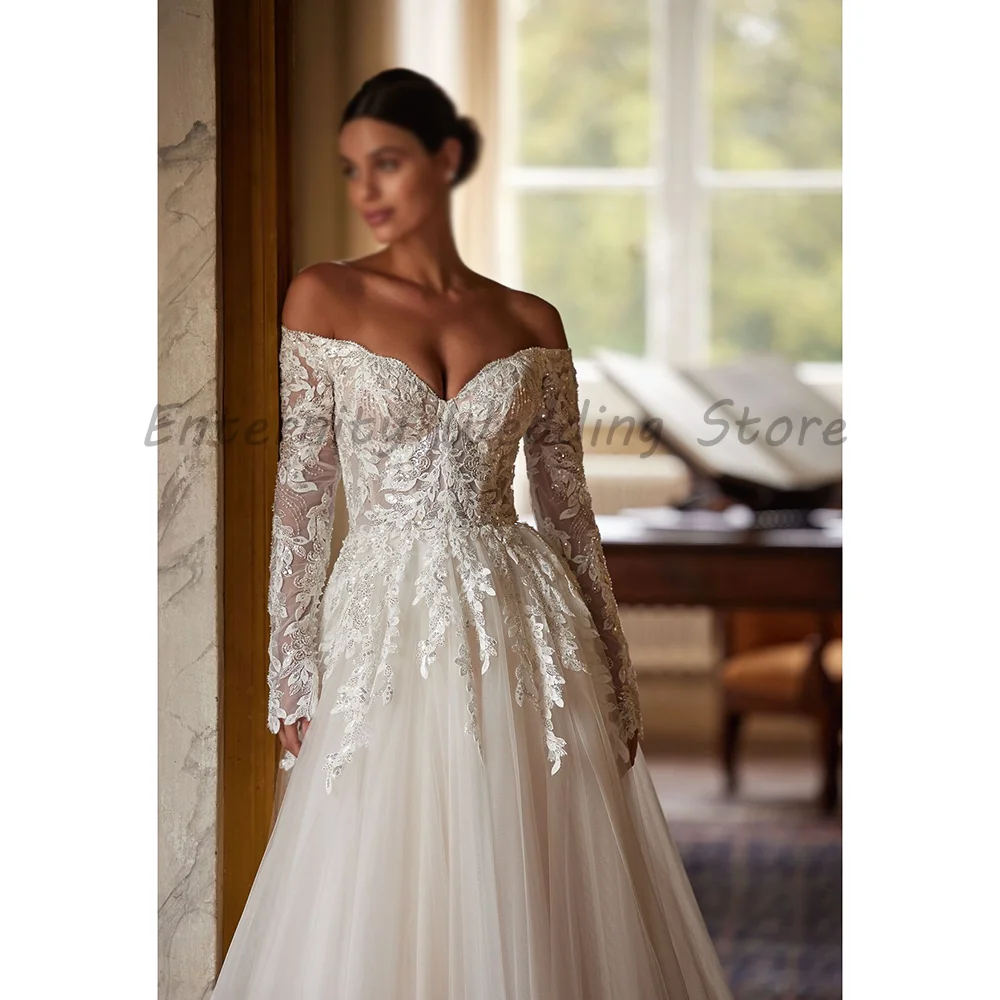 Off The Shoulder Long Sleeve Lace Wedding Dress Sweetheart V Neck Appliques Tulle A Line Bridal Gown With Train