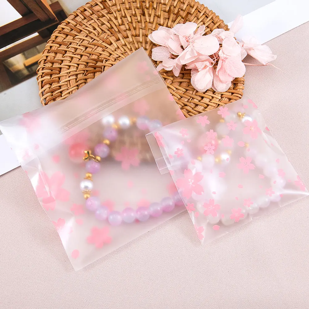 100pcs Plastic Packing Bags Flower Self-Adhesive Bags OPP Pouches for Jewelry Gifts Biscuits Candy Cookies Packaging