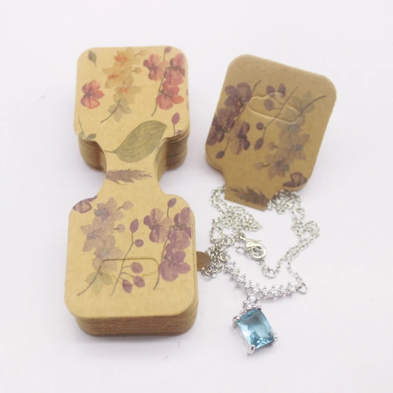 100 pcs 9x3.5cm Latest Printed Jewelry Necklace Bracelet Hang Tag Kraft Paper Folding Necklace Earring Set Packaging Card