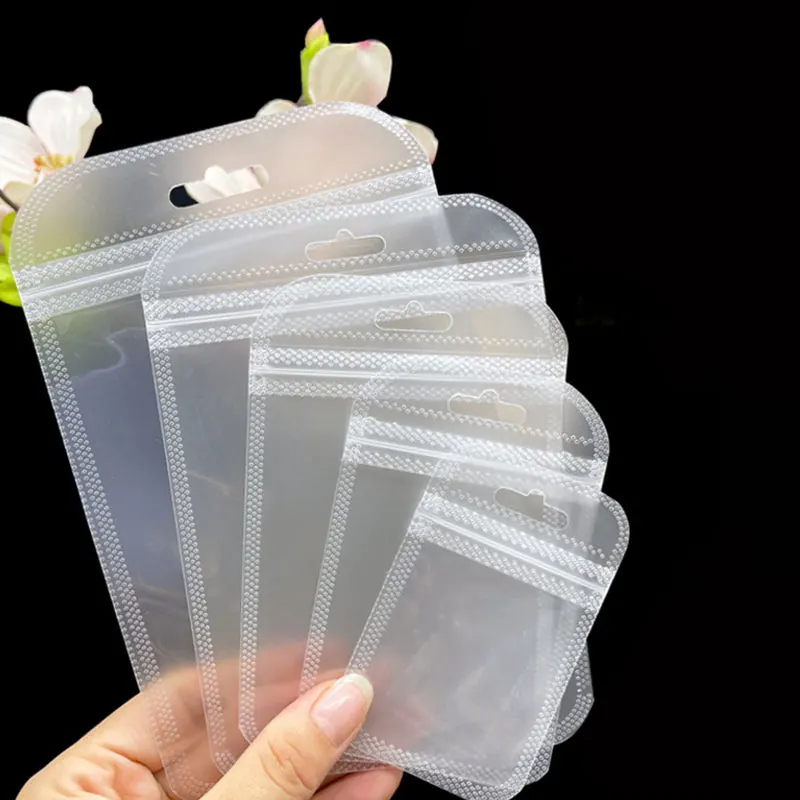 50pcs Thicken Resealable Ziplock OPP Bags Laser Iridescent Bag Clear Storage Bag White Bag with Hang Hole for DIY Jewelry Making