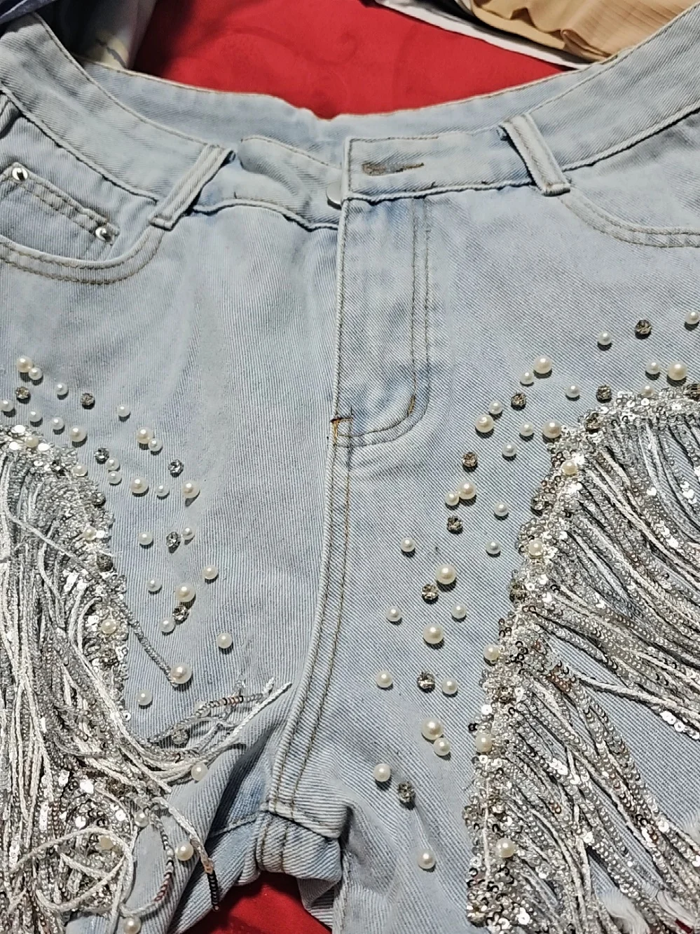 Women High-Waisted Rhinestone Pearl Fringe Denim Shorts Light Wash Distressed Design with Sparkly Tassel Trim Shorts