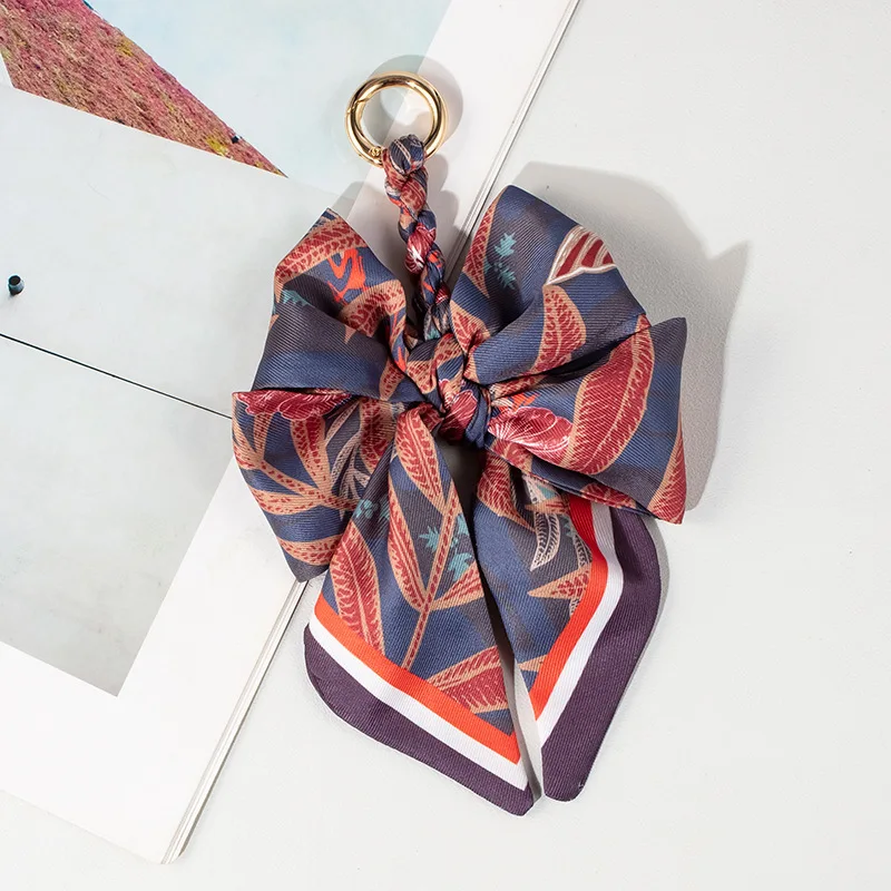New Fashion Keychain for Women Small Bow Woven Bag Pendant Bag Hanging Accessories Adjustment Bag Extension Chain Bow Bag Strap