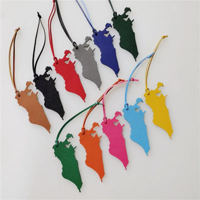 Factory Wholesale Custom Made Genuine Natural Leather Bahrain Map Keychain Ladies Backpack Pendant Women Men Bag Charm