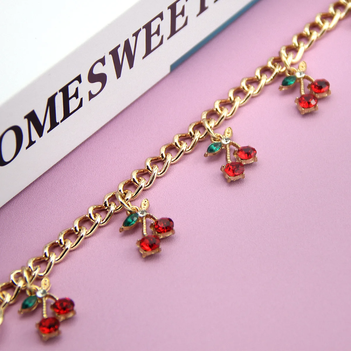 Fashion temperament glass stone red cherry chain jewelry bag hanging jewelry bag charm bag accessories