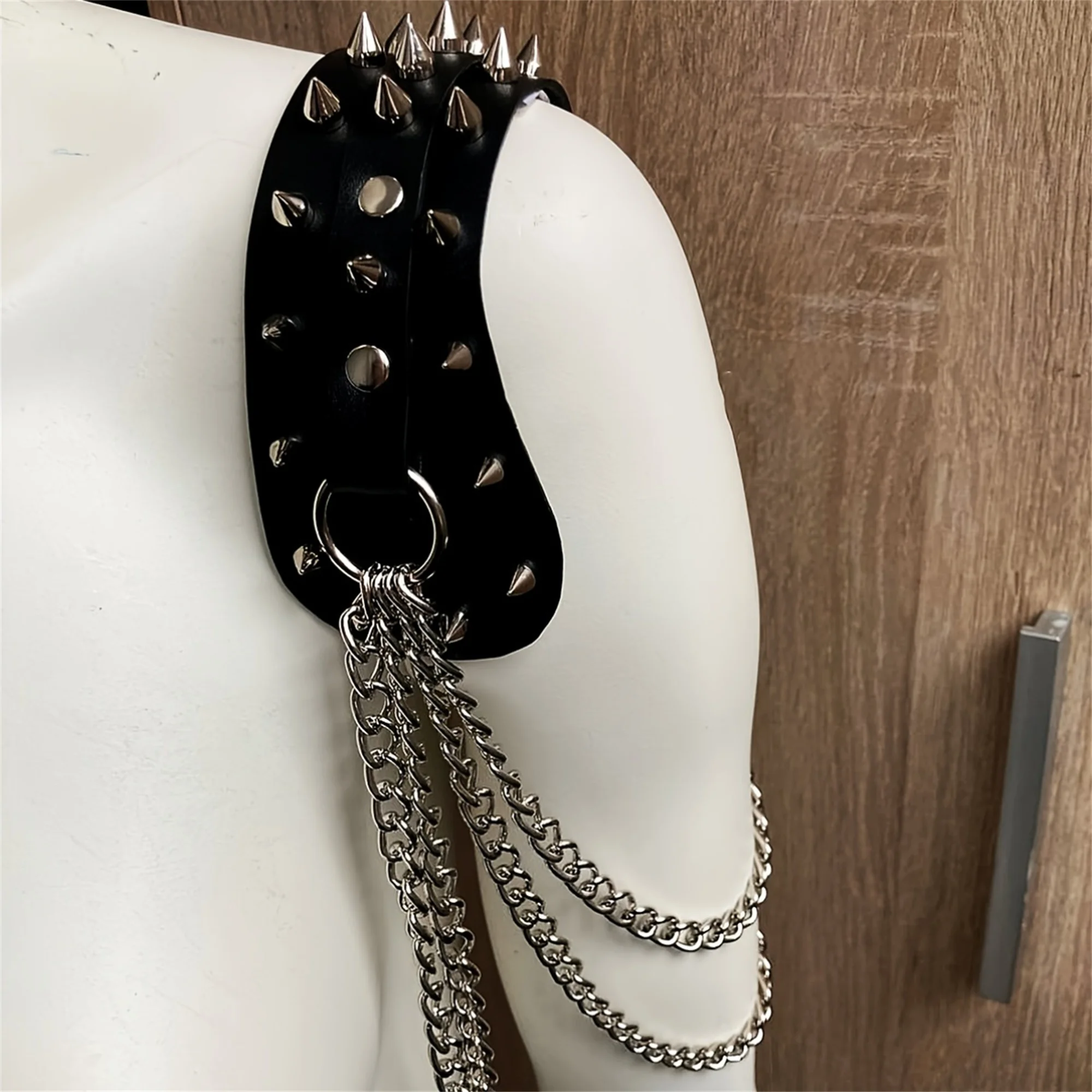 UYEE unisex synthetic leather shoulder armor with rivet details and chain tassel fashionable black studded waistband accessory