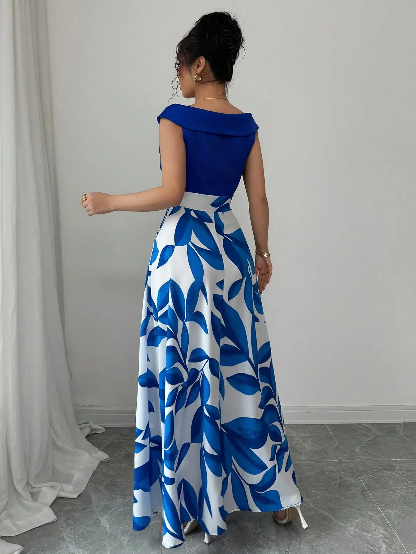 Women's Blue White Floral Maxi Dress Asymmetric Neckline Color Block Design Ideal for Evening Events Garden Parties Elegant Styl