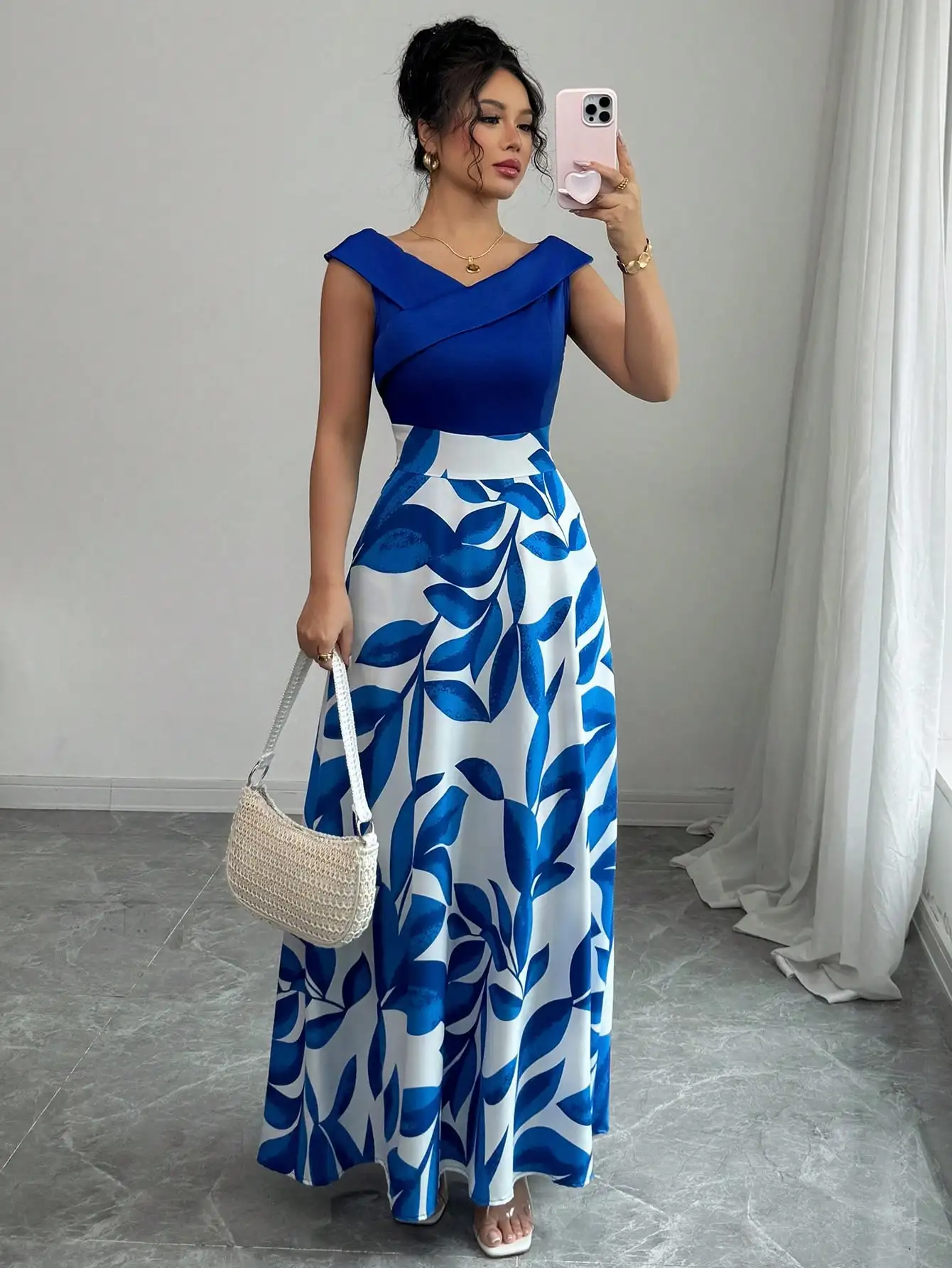 Women's Blue White Floral Maxi Dress Asymmetric Neckline Color Block Design Ideal for Evening Events Garden Parties Elegant Styl