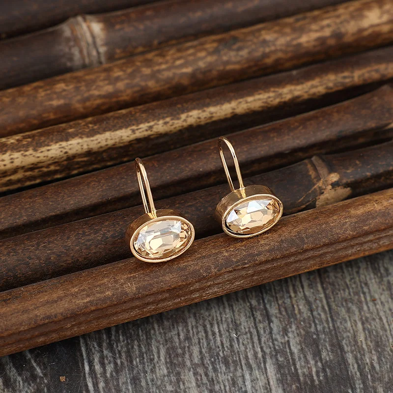 Fashion Metal Gold Color Oval Champagne Stone Dangle Earrings for Women Exquisite Engagement Wedding Earrings Jewelry