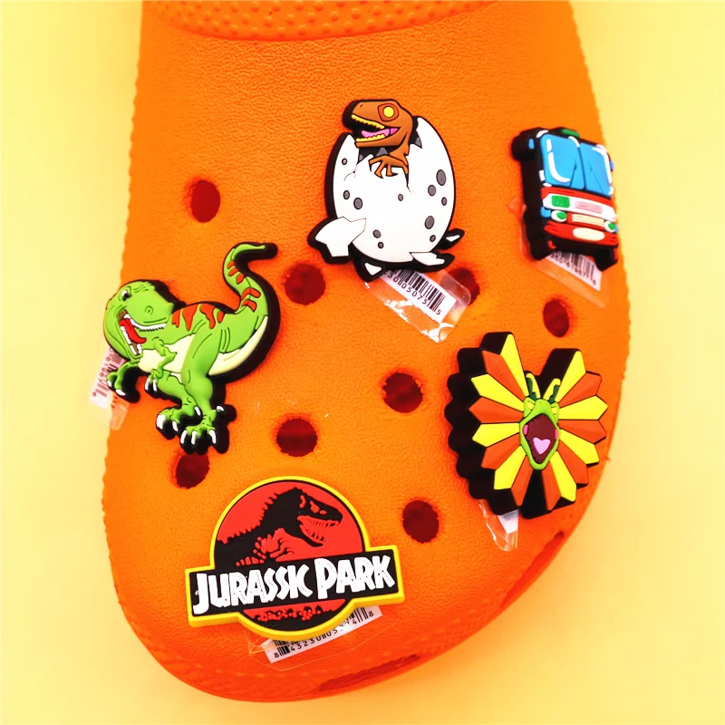 Original 1pcs Dilophosaurus PVC Shoe Charms Accessories Decorations Jurassic Dinosaurs Bus Designer Shoe Clips Buckle Kids Gifts