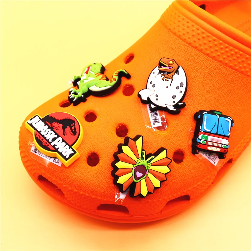 Original 1pcs Dilophosaurus PVC Shoe Charms Accessories Decorations Jurassic Dinosaurs Bus Designer Shoe Clips Buckle Kids Gifts