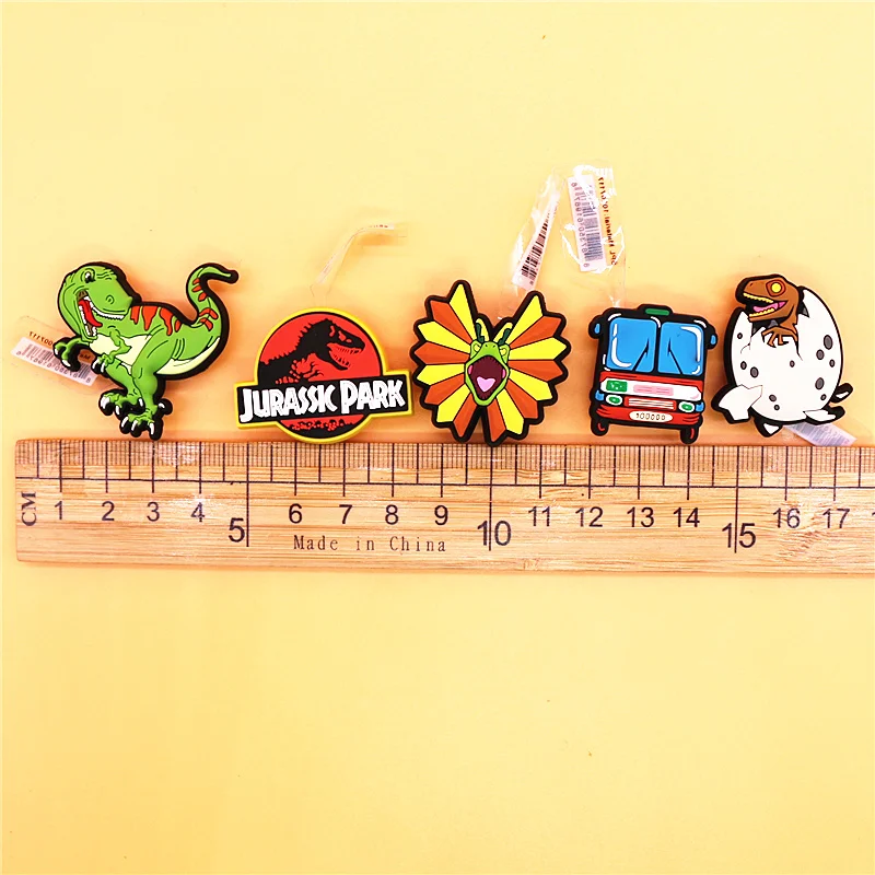 Original 1pcs Dilophosaurus PVC Shoe Charms Accessories Decorations Jurassic Dinosaurs Bus Designer Shoe Clips Buckle Kids Gifts