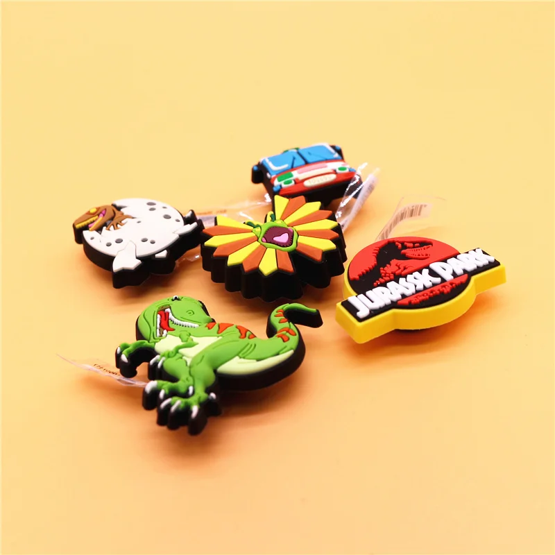 Original 1pcs Dilophosaurus PVC Shoe Charms Accessories Decorations Jurassic Dinosaurs Bus Designer Shoe Clips Buckle Kids Gifts