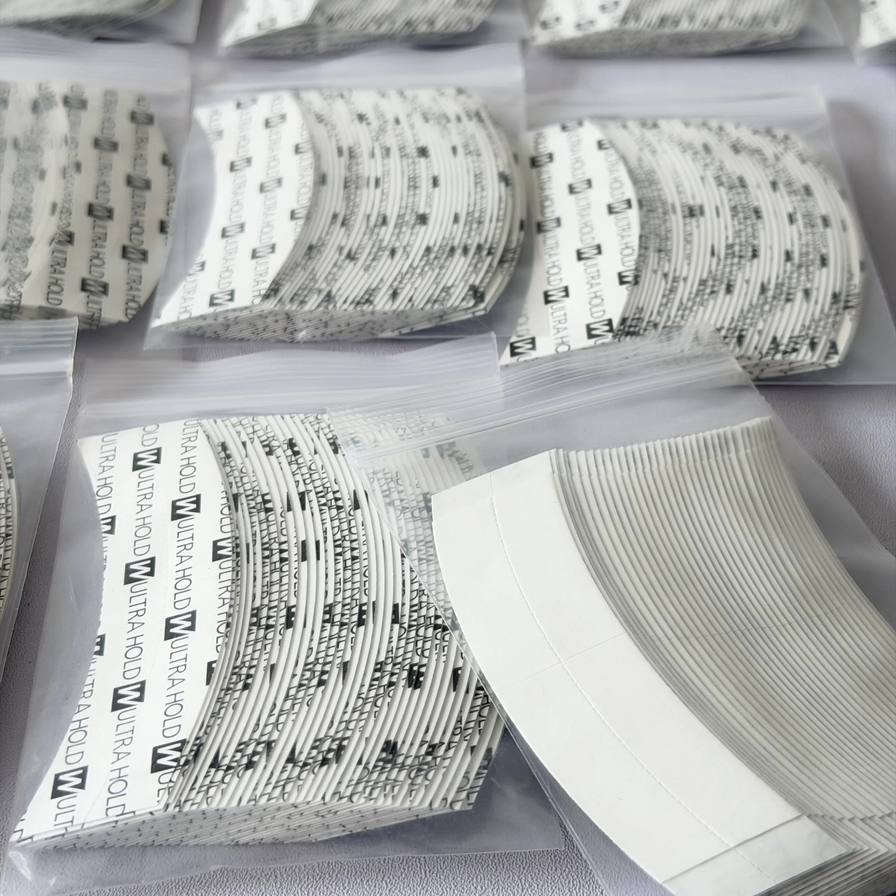 36pcs /180pcs/360pcs Ultra Hold Wig Tape Double Sided Adhesive Waterproof Sweatproof Arc Tape for Lace Wig Toupee Hair System