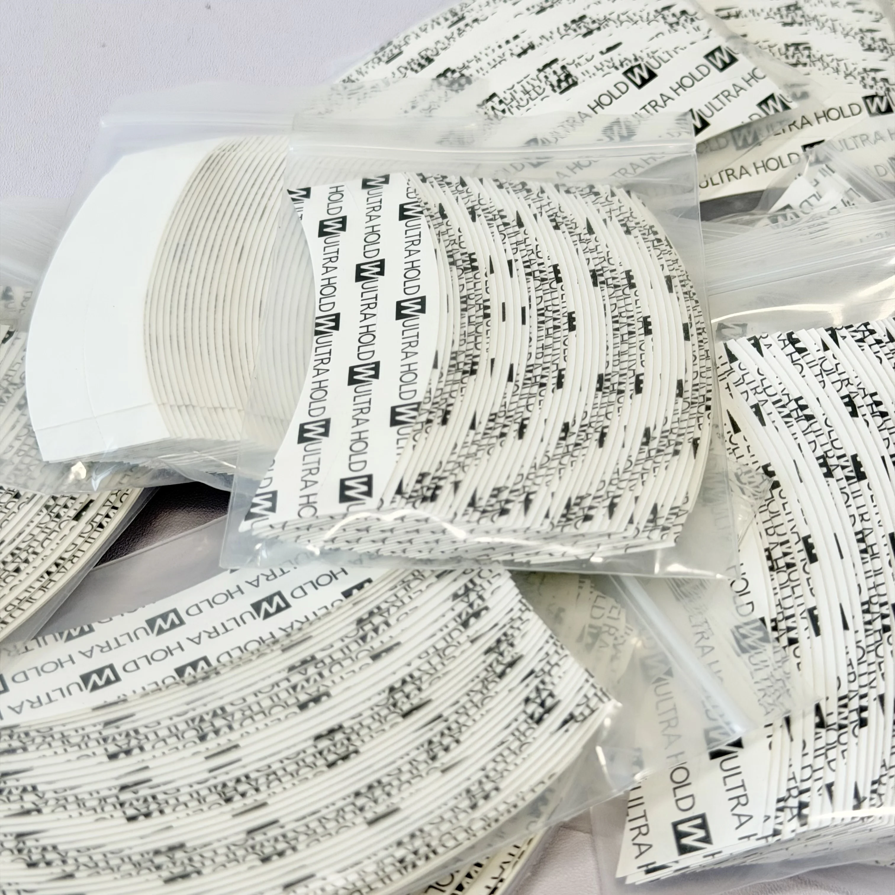 36pcs /180pcs/360pcs Ultra Hold Wig Tape Double Sided Adhesive Waterproof Sweatproof Arc Tape for Lace Wig Toupee Hair System