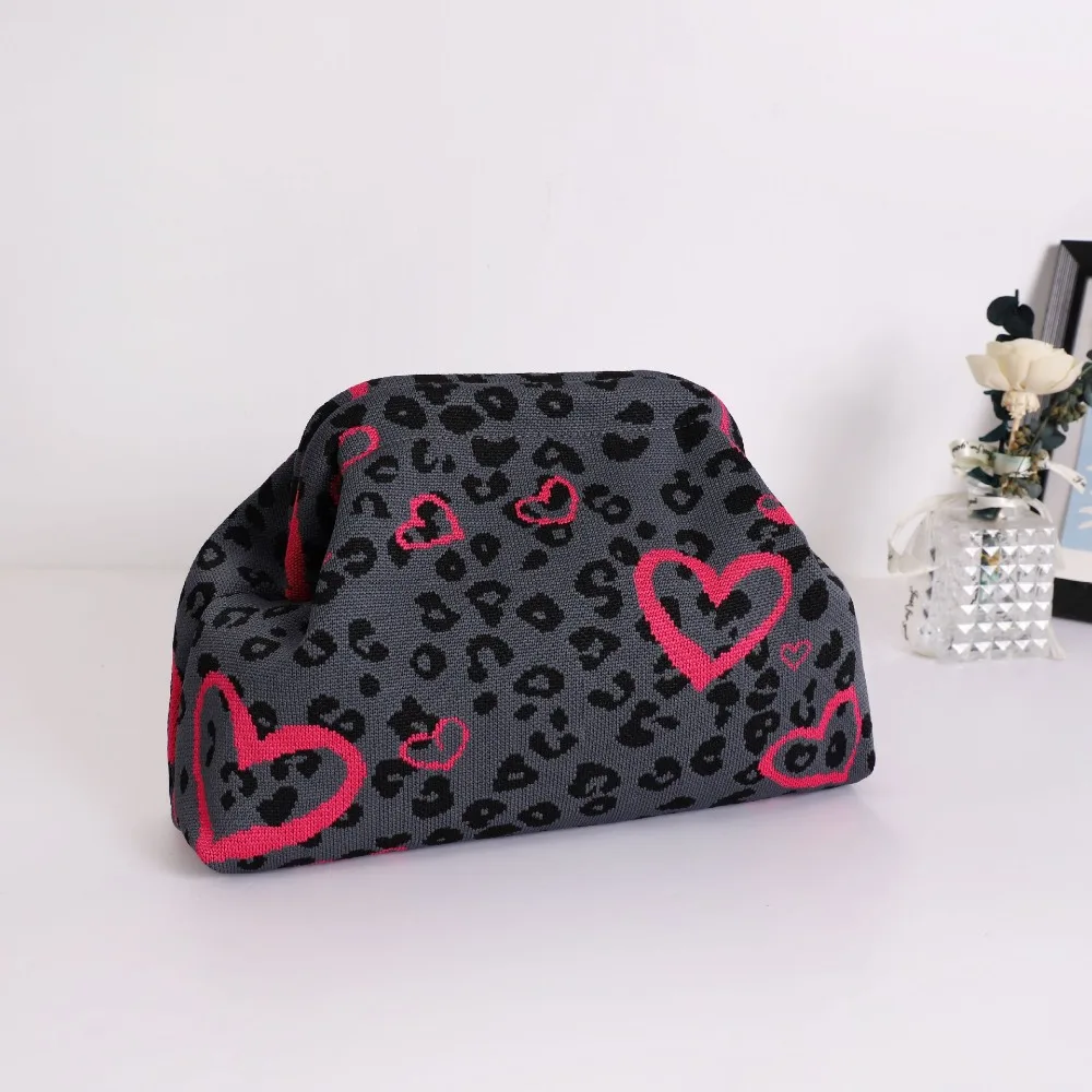 Trendy Cow Print Dot Handbag with High-End Color-Blocking Knitted Clip-On Design, Spacious and Versatile Fashion Tote.