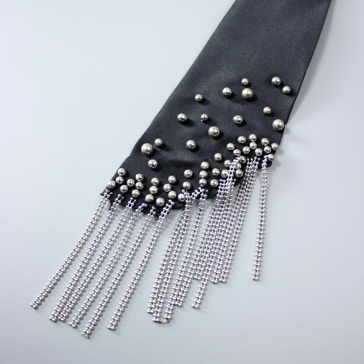 One Piece of Ladies' Tassel Cravat. It Is Studded with Beads and Has a Chain Design, Featuring a Bohemian, punk, and Industrial
