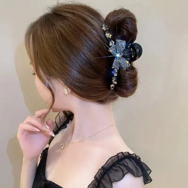 Elegant large acrylic bow hair clip with sparkling rhinestones - a fashionable solid color accessory for women and girls
