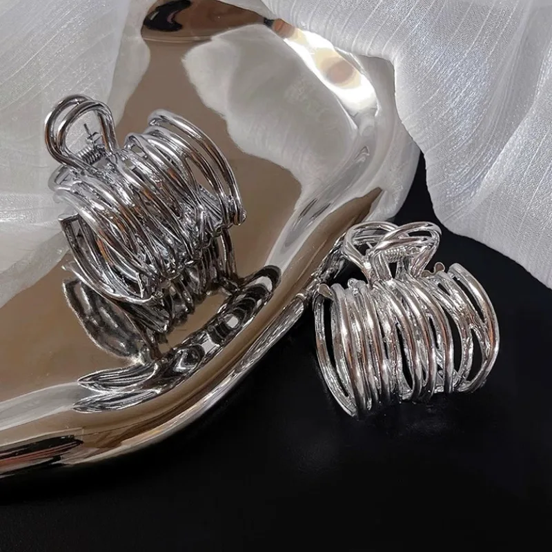 Hollow Metal Fixed Artifact Hair Clip Temperament Clip Cool Style High-end Feeling Women's High Ponytail Grip Clip