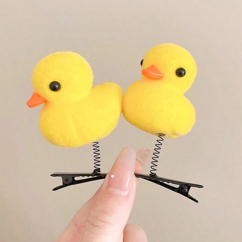 2 new pieces of cute fuzzy chicken hair clips, with a little yellow chick and a red heart peach as hair ornaments.
