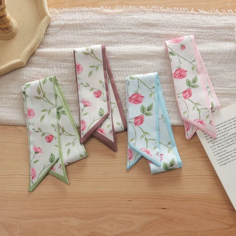 Elegant ladies’ long ribbon scarf with a rose pattern; versatile as a hairband, bag strap or neck scarf; a stylish accessory