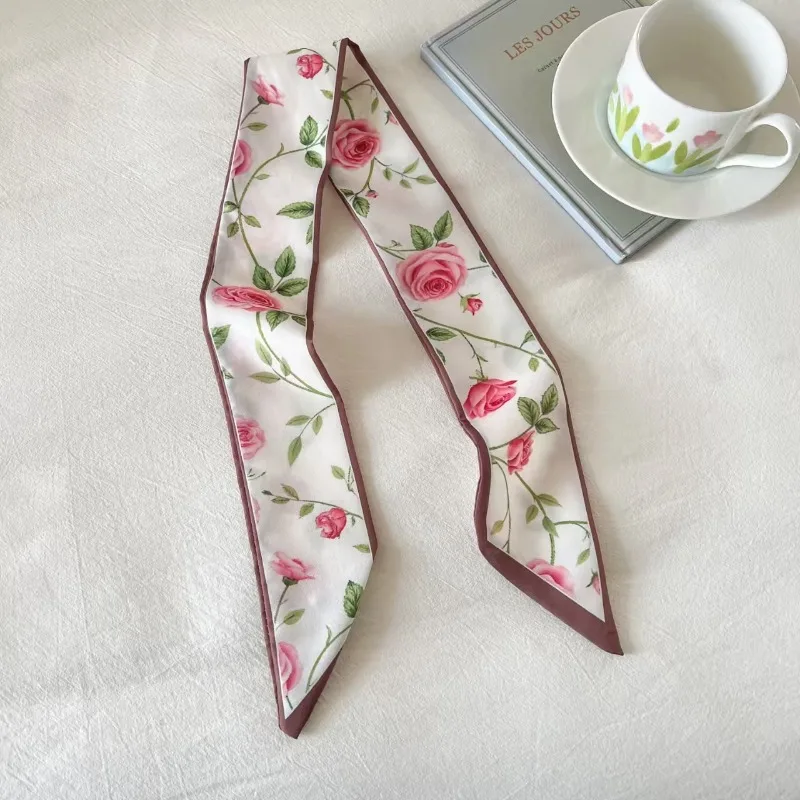Elegant ladies’ long ribbon scarf with a rose pattern; versatile as a hairband, bag strap or neck scarf; a stylish accessory
