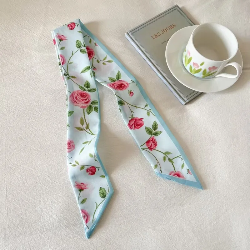 Elegant ladies’ long ribbon scarf with a rose pattern; versatile as a hairband, bag strap or neck scarf; a stylish accessory