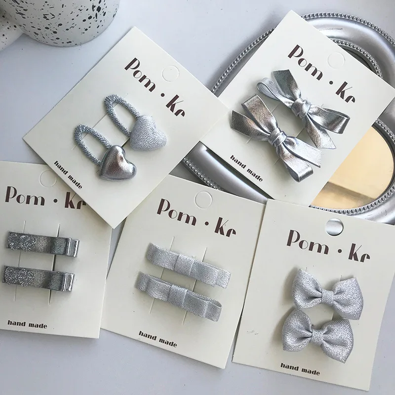 New elegant silver bow leather hair clips:Kids' stylish versatile alligator clips—high-quality, hair-friendly,perfect for babys