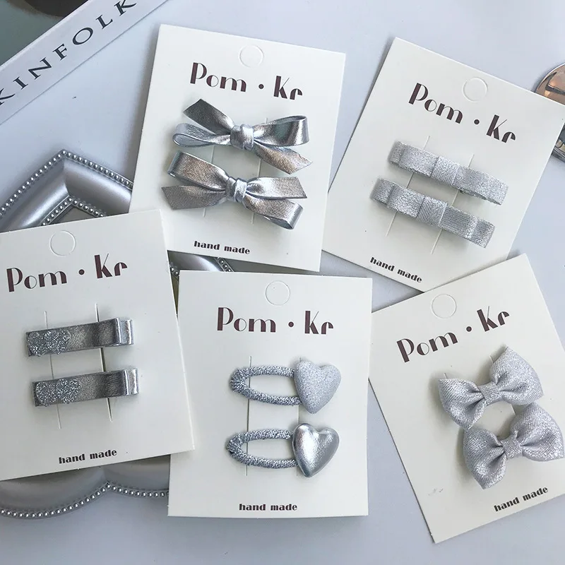 New elegant silver bow leather hair clips:Kids' stylish versatile alligator clips—high-quality, hair-friendly,perfect for babys