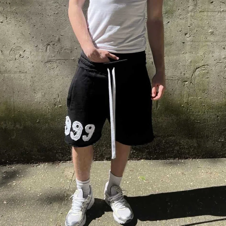 Trendy High Street Trend Loose Casual Personality999 Pattern Embroidery Elastic Waist Lace Up Sports five quarter Pants Men Wom