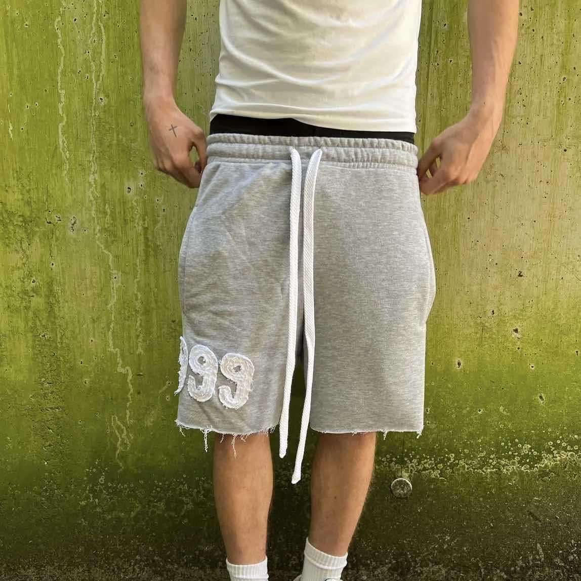 Trendy High Street Trend Loose Casual Personality999 Pattern Embroidery Elastic Waist Lace Up Sports five quarter Pants Men Wom