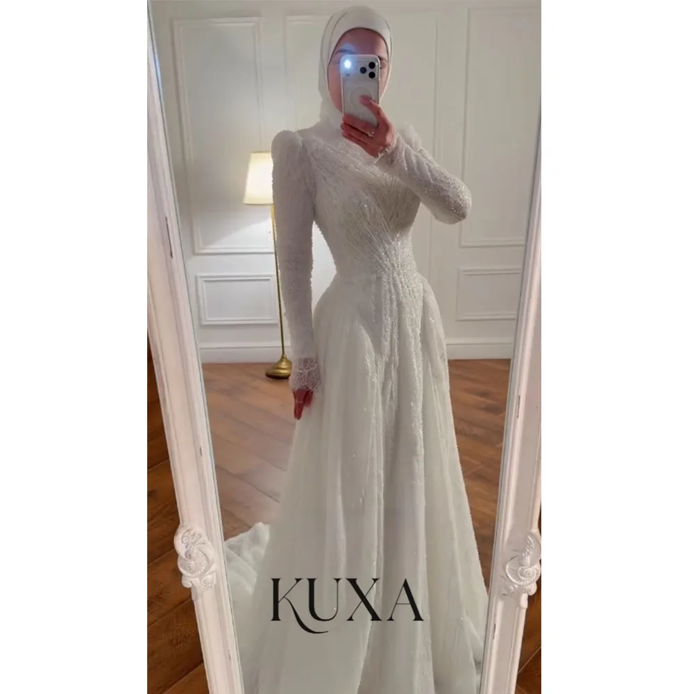 KUXA Customized Muslim Dubai Luxury Wedding Dresses Lace Beaded A-Line Arabic Full Sleeves Bridal Gowns For Women Robe De Mariée