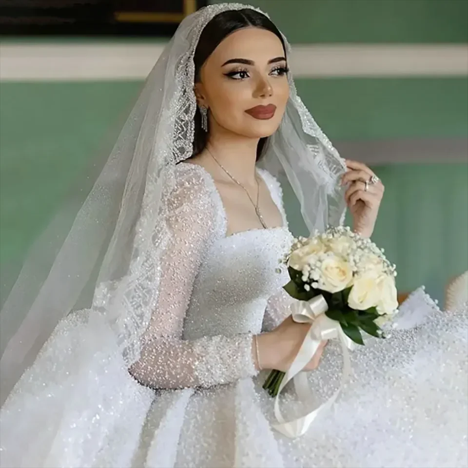 Flavinke Customized Gorgeous Beaded Sequin Boat Neck Ball Gown Wedding Dresses Long Sleeves Court Train Tulle Bridal Gowns