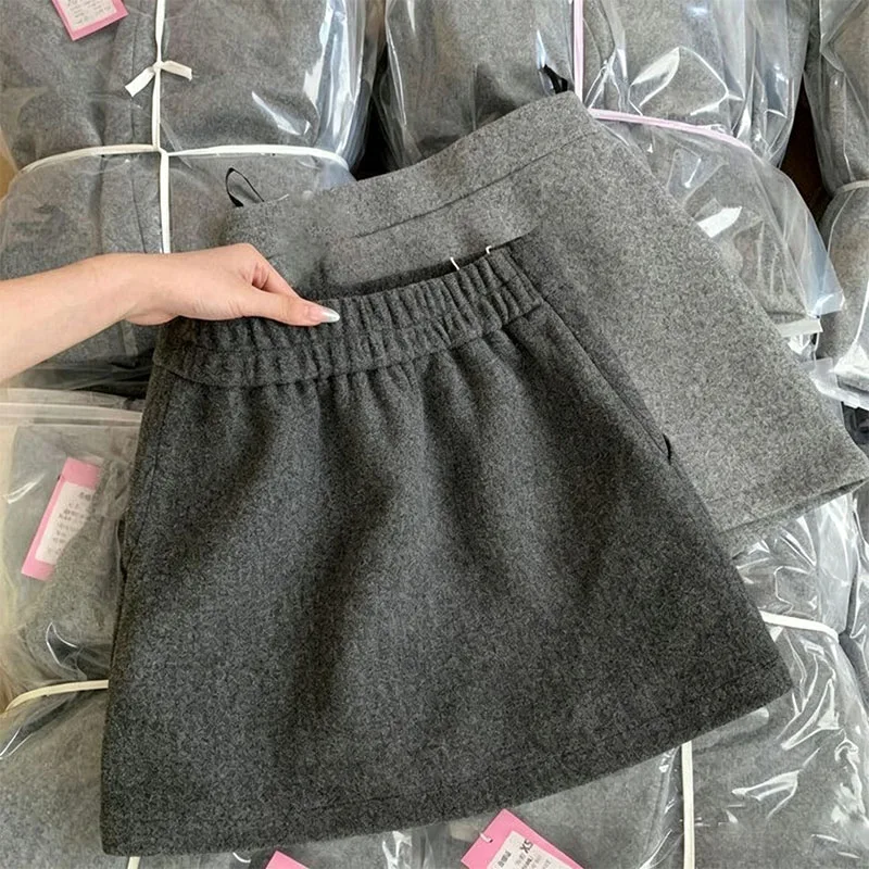 2026 New Gray Thicken Woolen Skirts Women Autumn Winter High Waist Anti-Glare Short Skirt Female Solid Simple Blended Skirts
