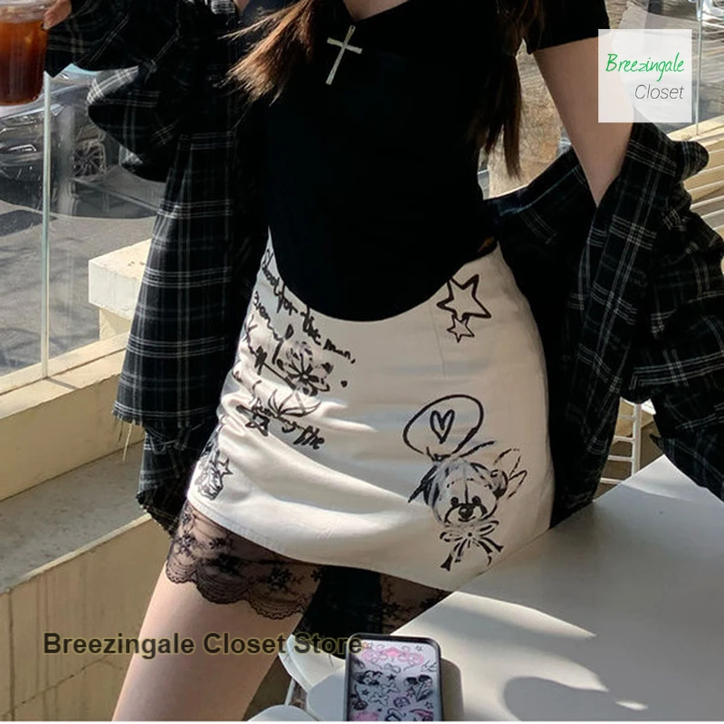 French lace graffiti skirt women's summer A-line skirt is thin and slim, with a drooping satin design and a splicing skirt.