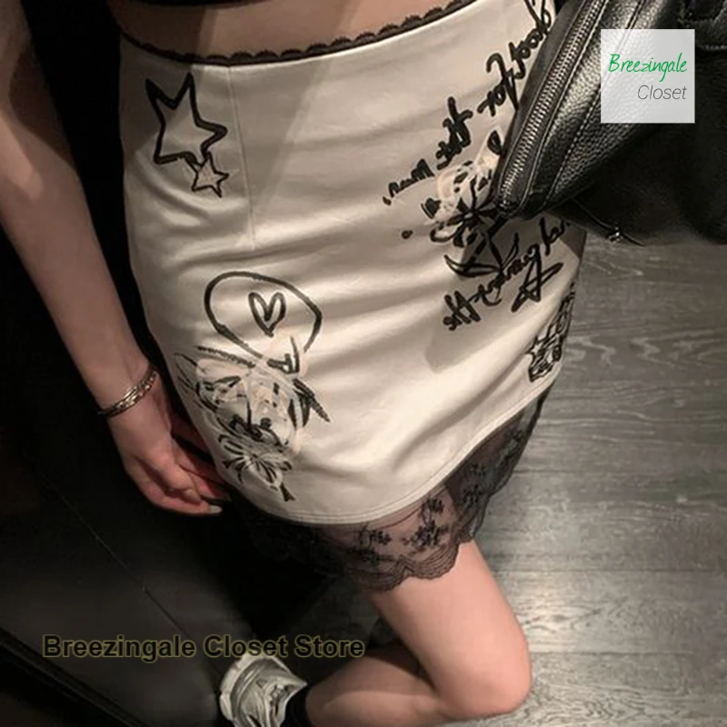 French lace graffiti skirt women's summer A-line skirt is thin and slim, with a drooping satin design and a splicing skirt.