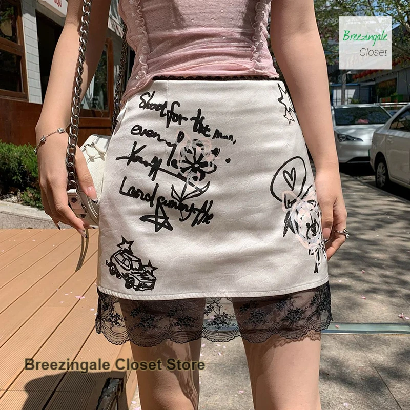 French lace graffiti skirt women's summer A-line skirt is thin and slim, with a drooping satin design and a splicing skirt.