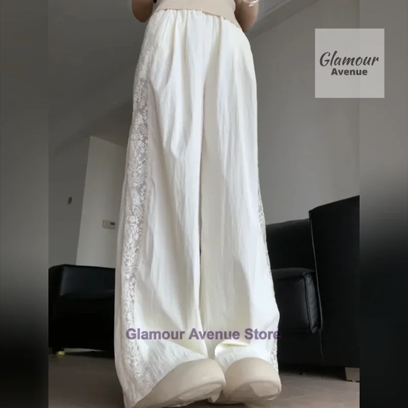 French retro lace design stitching pants women's summer new fashion temperament straight loose wide leg drop casual pants.