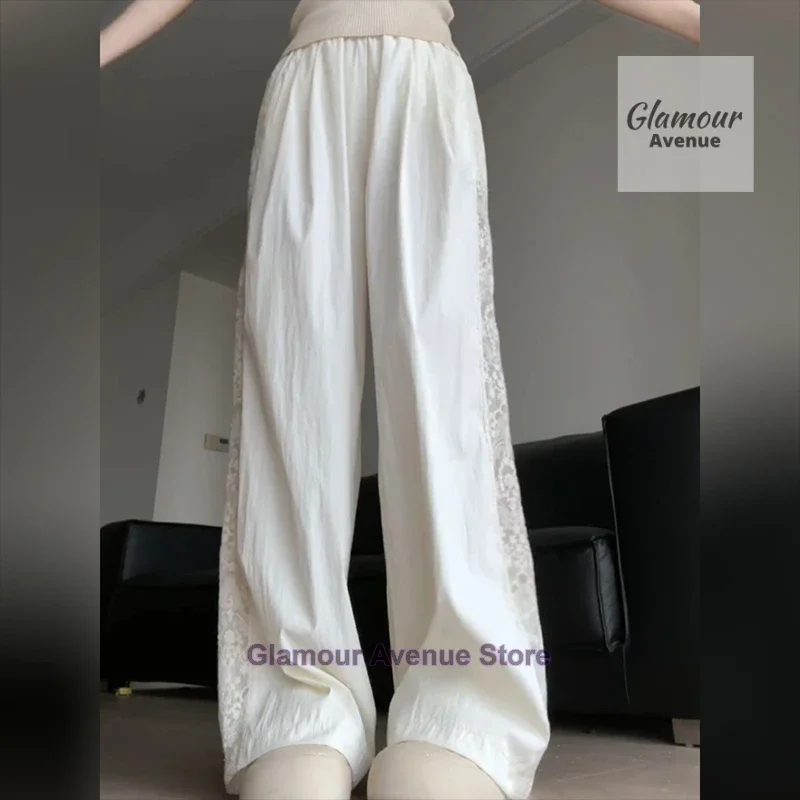 French retro lace design stitching pants women's summer new fashion temperament straight loose wide leg drop casual pants.