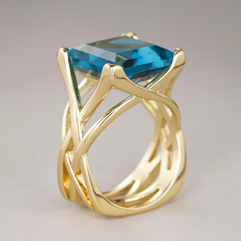 Huitan Cross Hollow Design Women Gold Color Ring Inlaid Bright White/Blue CZ Fashion Wedding Accessories Elegant Party Jewelry