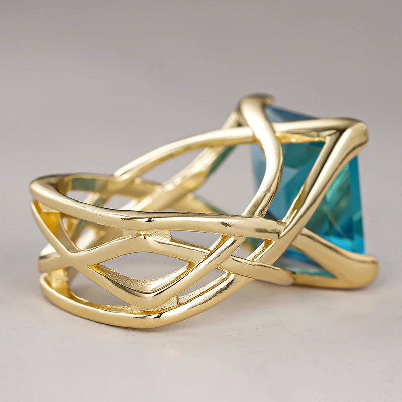 Huitan Cross Hollow Design Women Gold Color Ring Inlaid Bright White/Blue CZ Fashion Wedding Accessories Elegant Party Jewelry