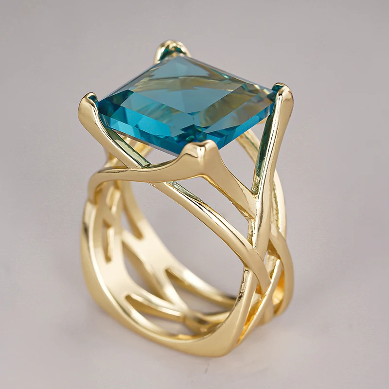 Huitan Cross Hollow Design Women Gold Color Ring Inlaid Bright White/Blue CZ Fashion Wedding Accessories Elegant Party Jewelry