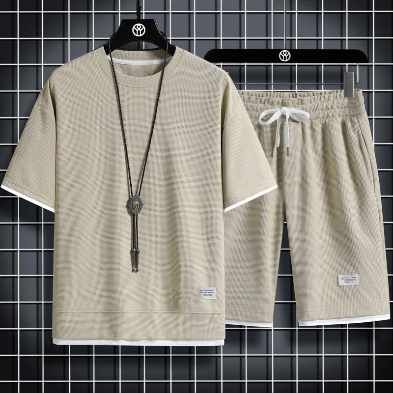 2024 Men's high qualityNew Summer Round Neck Short Sleeve Men Casual Sports Set Loose T-shirt Shorts Waffle Style Clothing