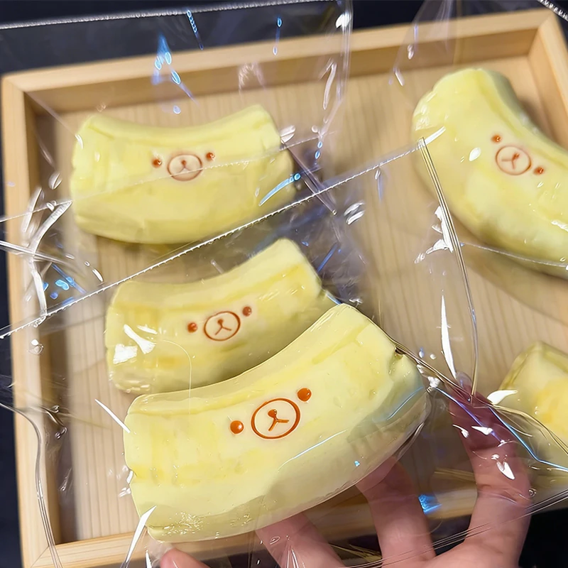 handmade Squishy with BUTTER texture - Banana bear Shaped Decor to Relieve Stress - Food grade silicone Safety Material 2026 S