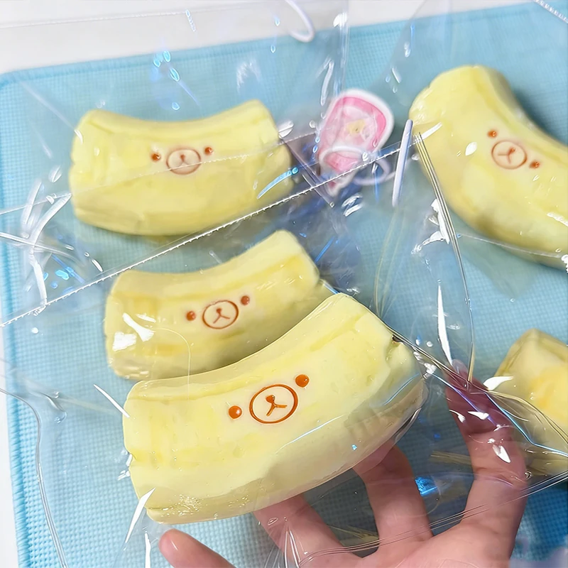 handmade Squishy with BUTTER texture - Banana bear Shaped Decor to Relieve Stress - Food grade silicone Safety Material 2026 S