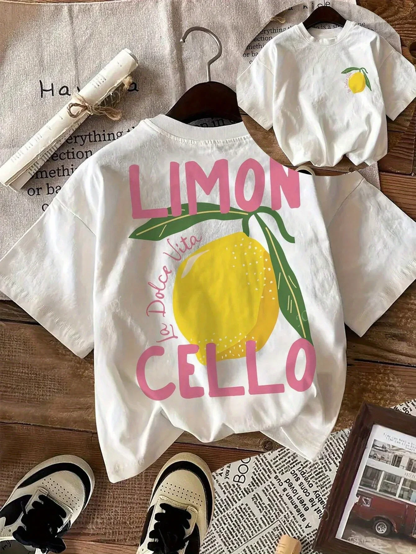 Summer children's cotton breathable and comfortable short sleeved top with lemon cartoon pattern printed on it