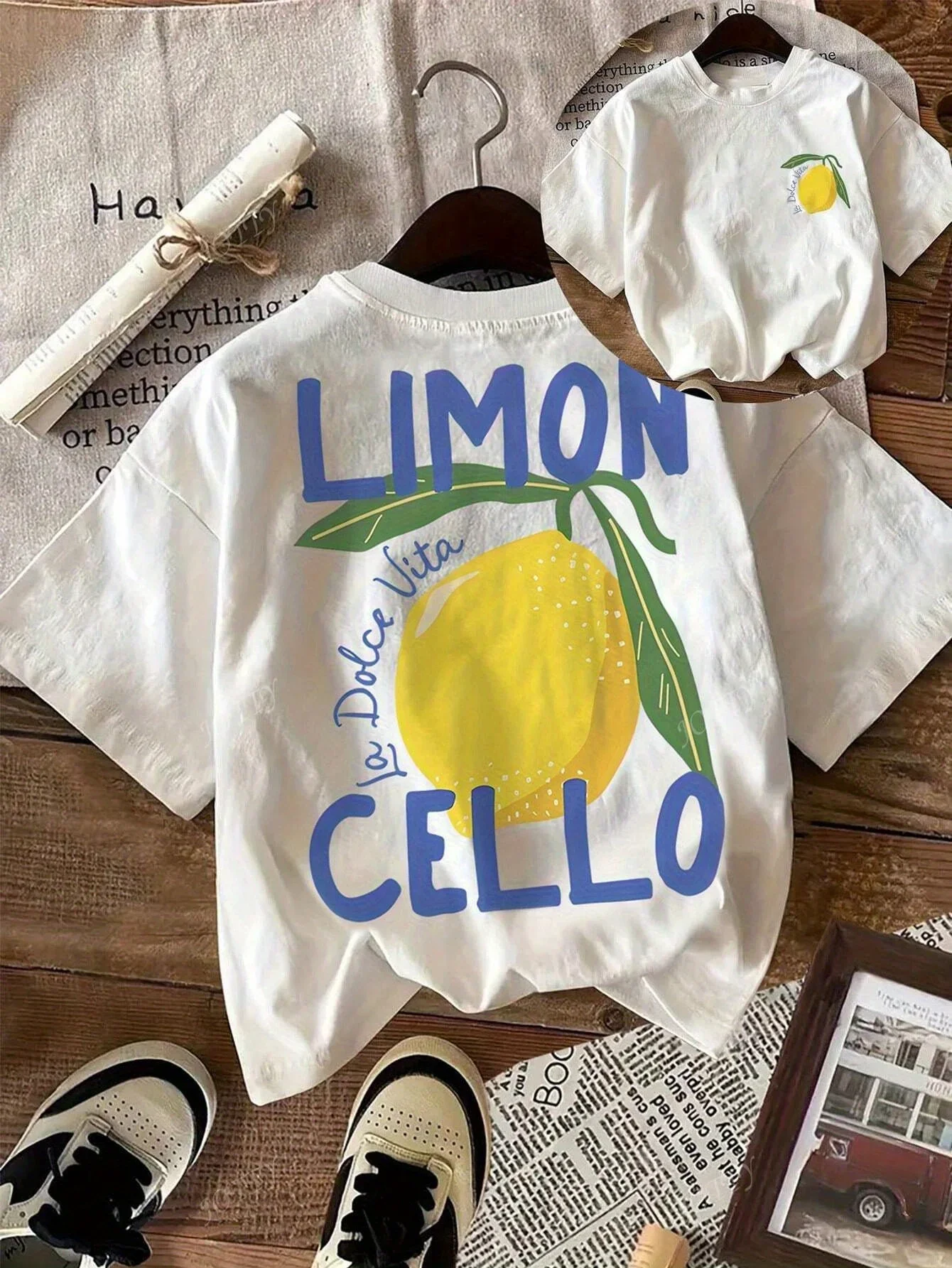 Summer children's cotton breathable and comfortable short sleeved top with lemon cartoon pattern printed on it