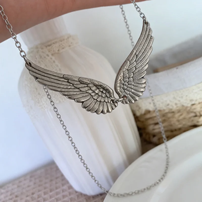 Y2K Angel Wing Feather Choker Necklace Silver Statement Angel Wing Pendant Chain Jewelry for Women Wedding Party Tribal Gifts